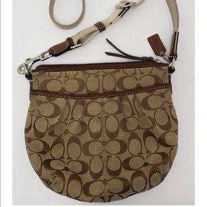 Woman’s Brown coach purse bag